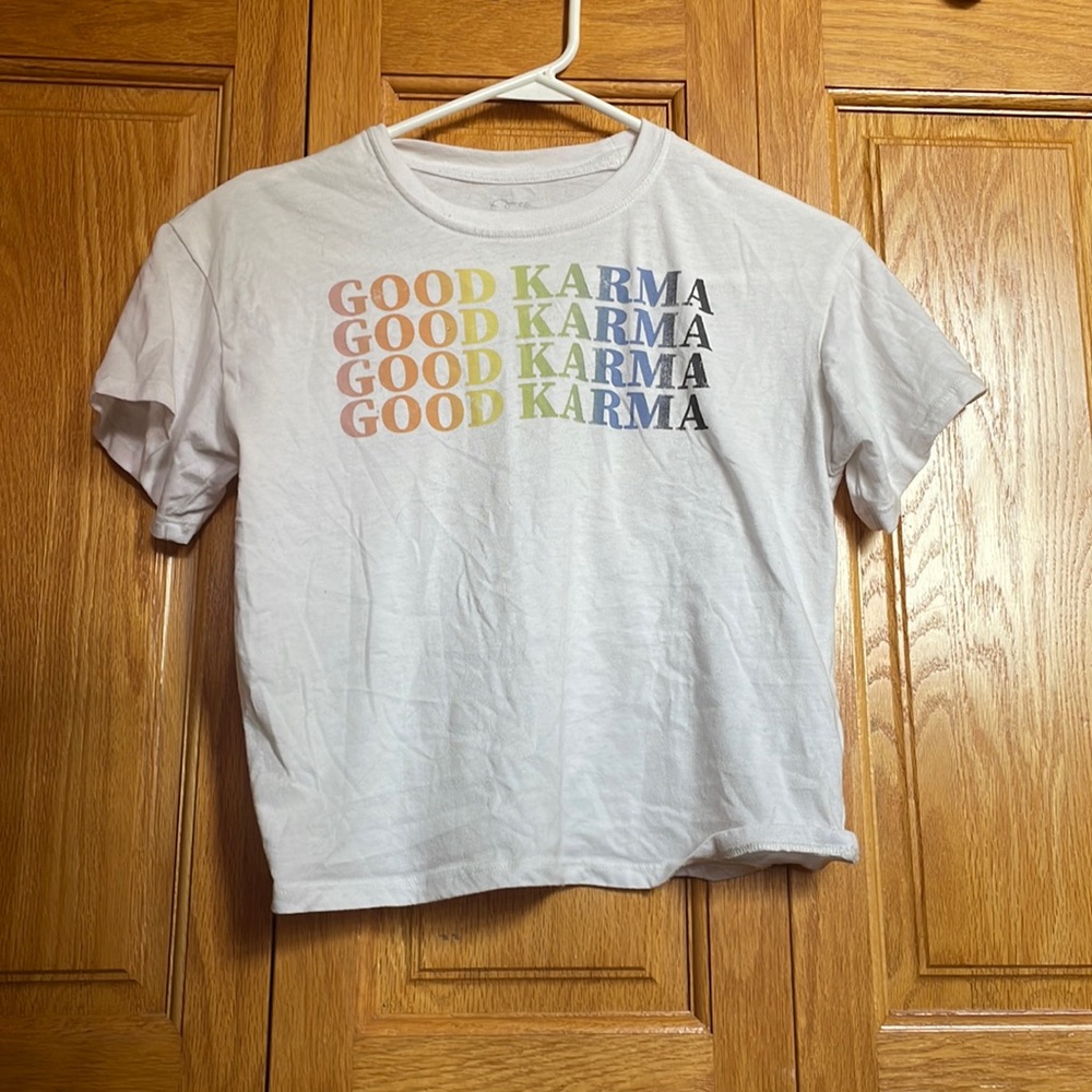 White loose T-shirt with words good karma